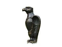 Eagle on wooden base - antique iron