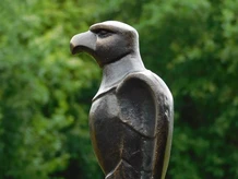 Eagle on wooden base - antique iron