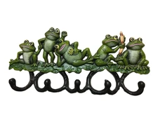 Coat rack with frogs