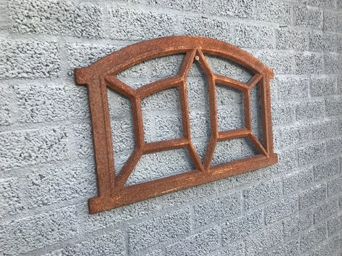 Cast iron stable window spider, small