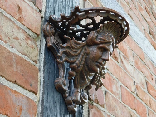 Wandkonsole Frauenkopf - aus Gusseisen - Braun - Gusseisen