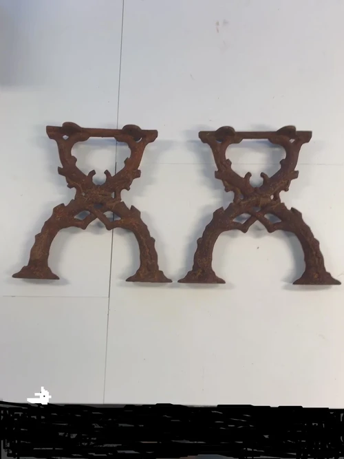 1 Pair of heavy solid cast iron side parts garden bench garden table.