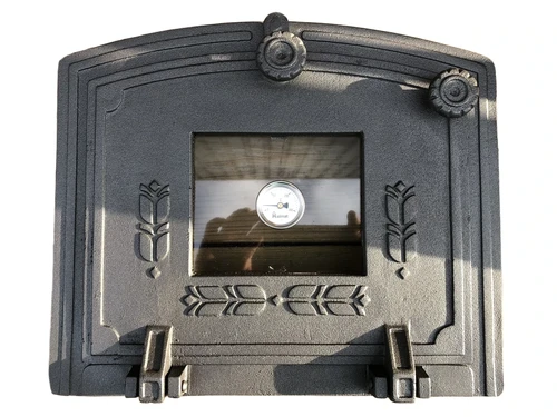 Ovendeur voor de kachel of oven+ temperatuur meter, kachel is van gietijzer.