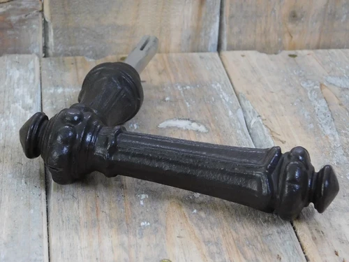 1 Beautiful heavy door handle made of antique iron, colour brown.