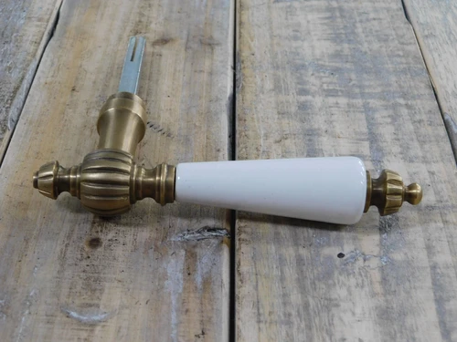 1 Door handle with ceramic handle white, patinated brass