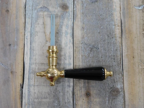 1 door handle with porcelain handle in black, polished brass with mandrel