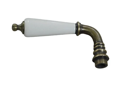 1 door handle brass with antique white ceramic handle, with mandrel.