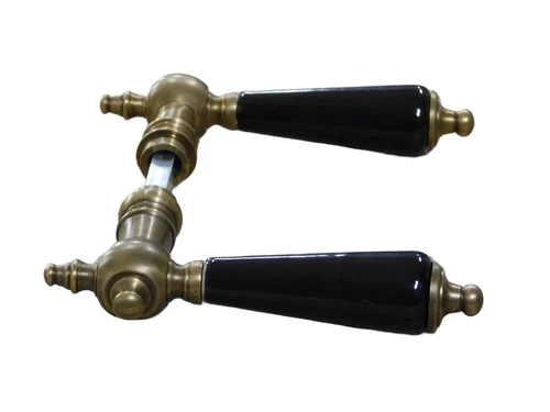 Set of door handles brass with black ceramic handles, incl. mandrel