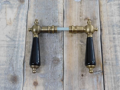Set of door handles brass with black ceramic handles, incl. mandrel