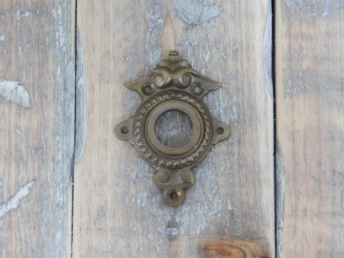 Rosette - patinated brass - for door handle or knob