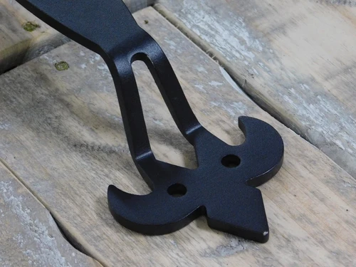 Large, high-quality wrought iron door handle with a medieval look