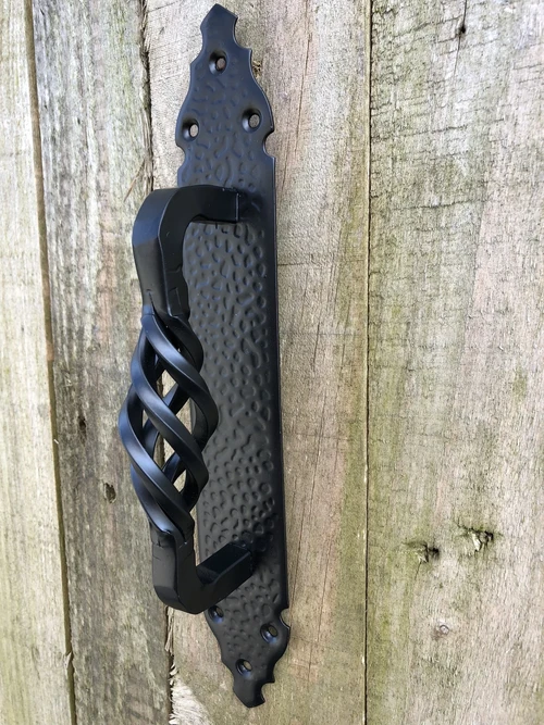 Wrought iron door handle for door, nice turned open handle.