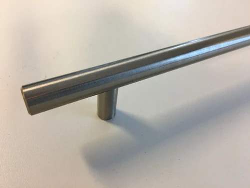 Sleek door-cabinet door handle, brushed aluminum.