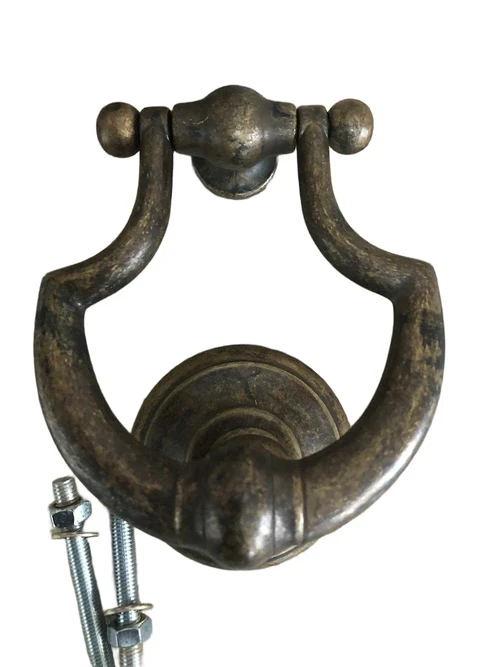 Door knocker, stylish and antique dark brass.