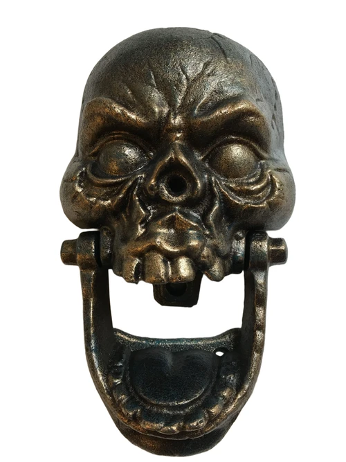 Cast iron bronze skull as door knocker.