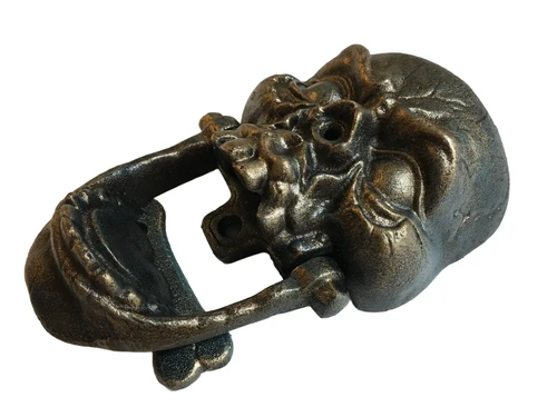 Cast iron bronze skull as door knocker.