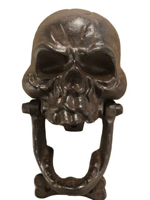 Cast iron brown skull as door knocker.