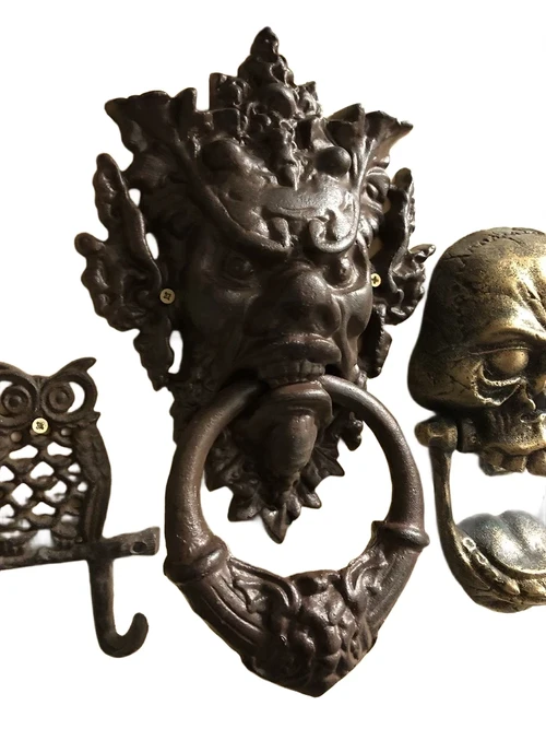 Cast iron door knocker with devil's head-dark brown, very distinctive!