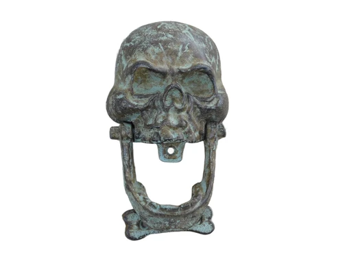 Cast iron green-brown skull as a door knocker.