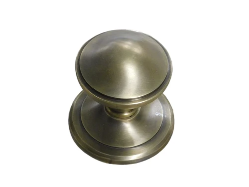 Fixed door knob - patinated brass - including rosette