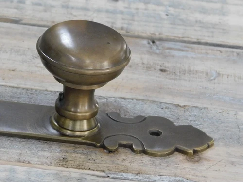 Half set of door hardware PZ92 - knob with long plate - patinated brass