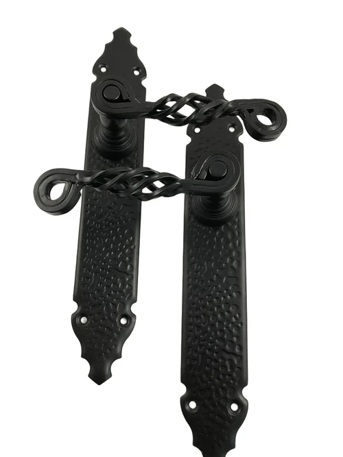 Set of front door hardware, beautiful wrought iron, black, closed door plate.