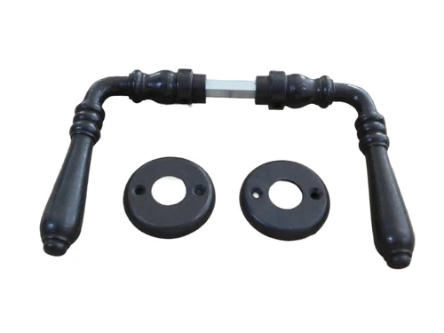 Door hardware set with 2 handles, 2 rosettes and a mandrel, dark brown