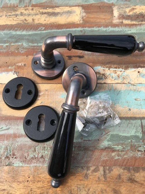 Set of door hardware Karn - antique look with black ceramic handles - black bb rosettes