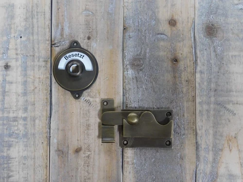 Turn lock for toilet door - patinated brass
