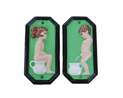 Set of signs for toilet door, cast iron painted, Man +Woman.