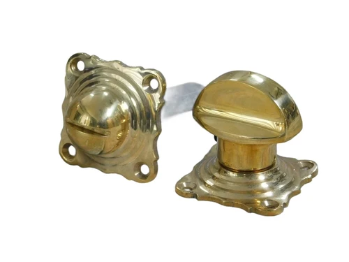 Toilet door closure, brass, twist lock guest toilet.
