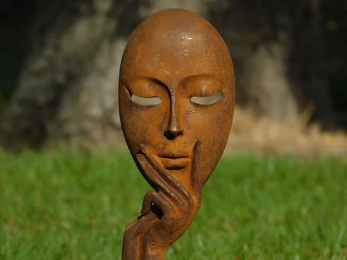 Statue ''the mask'' - cast iron - rust colour