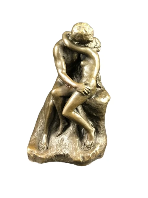 Een bronzen beeld van de kus, by Rodin.