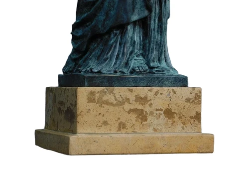 A bronze statue/sculpture of ''THE STATUE OF LIBERTY''