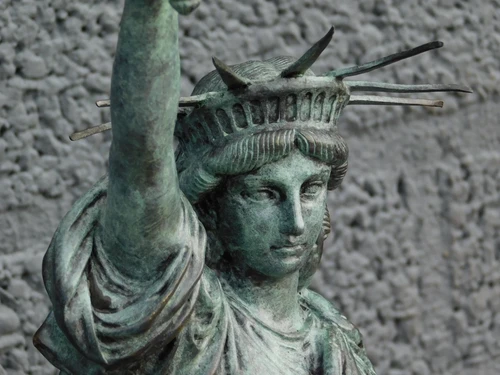 A bronze statue/sculpture of ''THE STATUE OF LIBERTY''