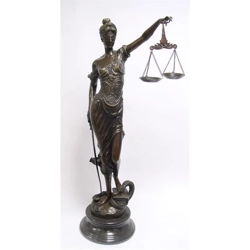 A bronze statue/sculpture of a gigantic Lady Justice