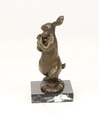 A bronze statue/sculpture of a rabbit with a cub