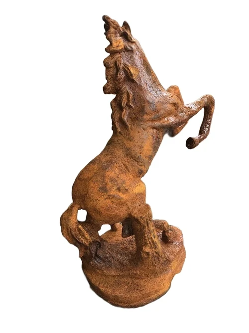 A beautiful statue of a rearing horse, cast iron rest