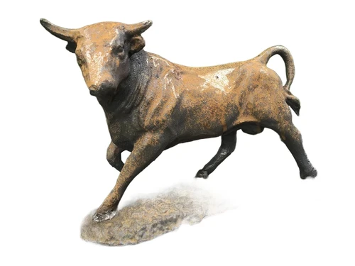 A beautiful statue of a bull, cast iron rest