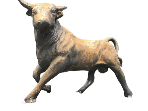 A beautiful statue of a bull, cast iron rest