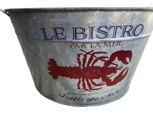 A very decorative, beautiful zinc bowl small with the text 