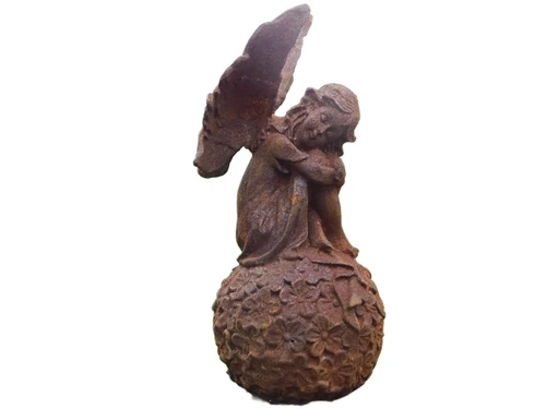 Angel on globe - cast iron