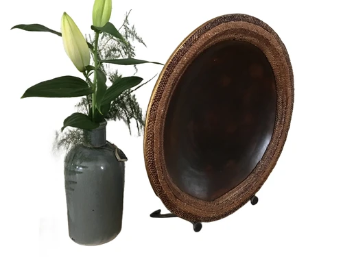 Beautiful Asian earthenware bowl on stand.