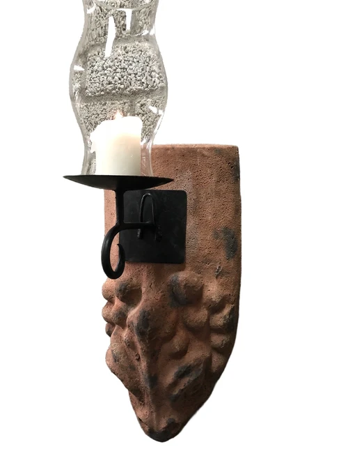 Wind light of roof tile with mythical image, with candlestick and glass flask.