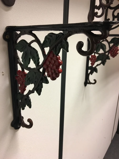 Beautiful shelf hanger with grape motif, cast iron-small