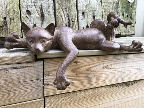 Sculpture lying cat from Polystein
