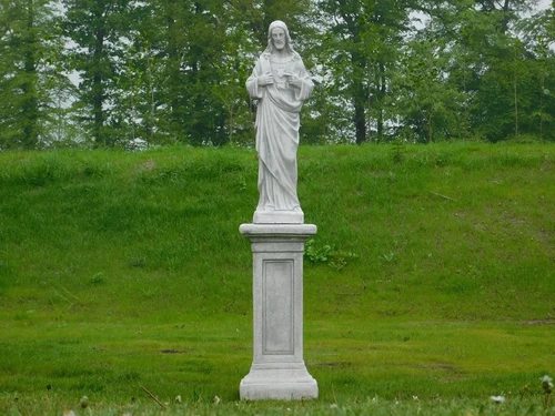 Sacred Heart statue on pedestal - solid stone