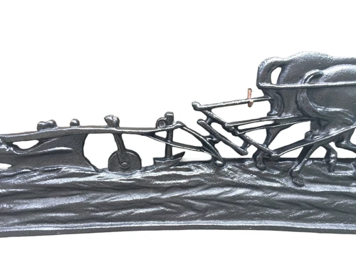 Wall decoration , cast iron black fireplace plate farmer with horse and plow.