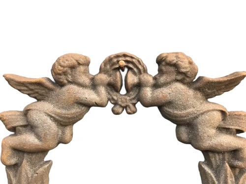 Wall ornament angel scene, cast iron.