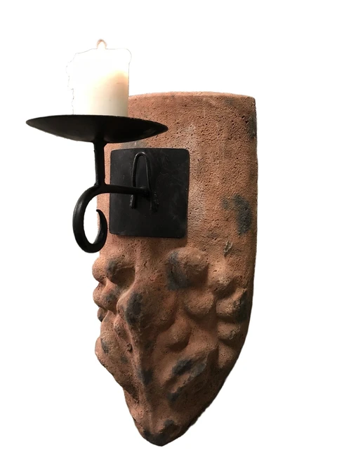Wind light from roof tile with mythical image, with candlestick.